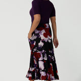 Size 10 woman wears the Berit Maxi skirt in the Fitzroy Print. Styled back with pink pumps and the Amethyst Ziggy Top. Made in Australia for women size 8 - 24. 