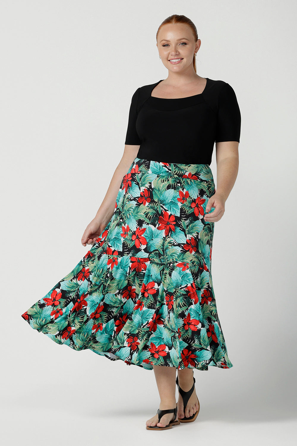 Size 12 woman wears Maxi Skirt in Havana print. The Berit Maxi skirt features a tier, a waistband and side pockets. Perfect for a weekend away or holiday capsule wardrobe. Made in Australia for women size 8 - 24.