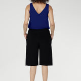 The knee-length cut delivers a flattering, versatile silhouette that moves seamlessly from casual days to elevated off-duty dressing.