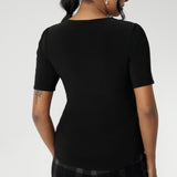Add a modern touch to your workwear essentials. Berni has been crafted for comfort and style, this classic black top with square neckline is available online from Australian women’s fashion brand Leina + Fleur in inclusive sizes 8–24.