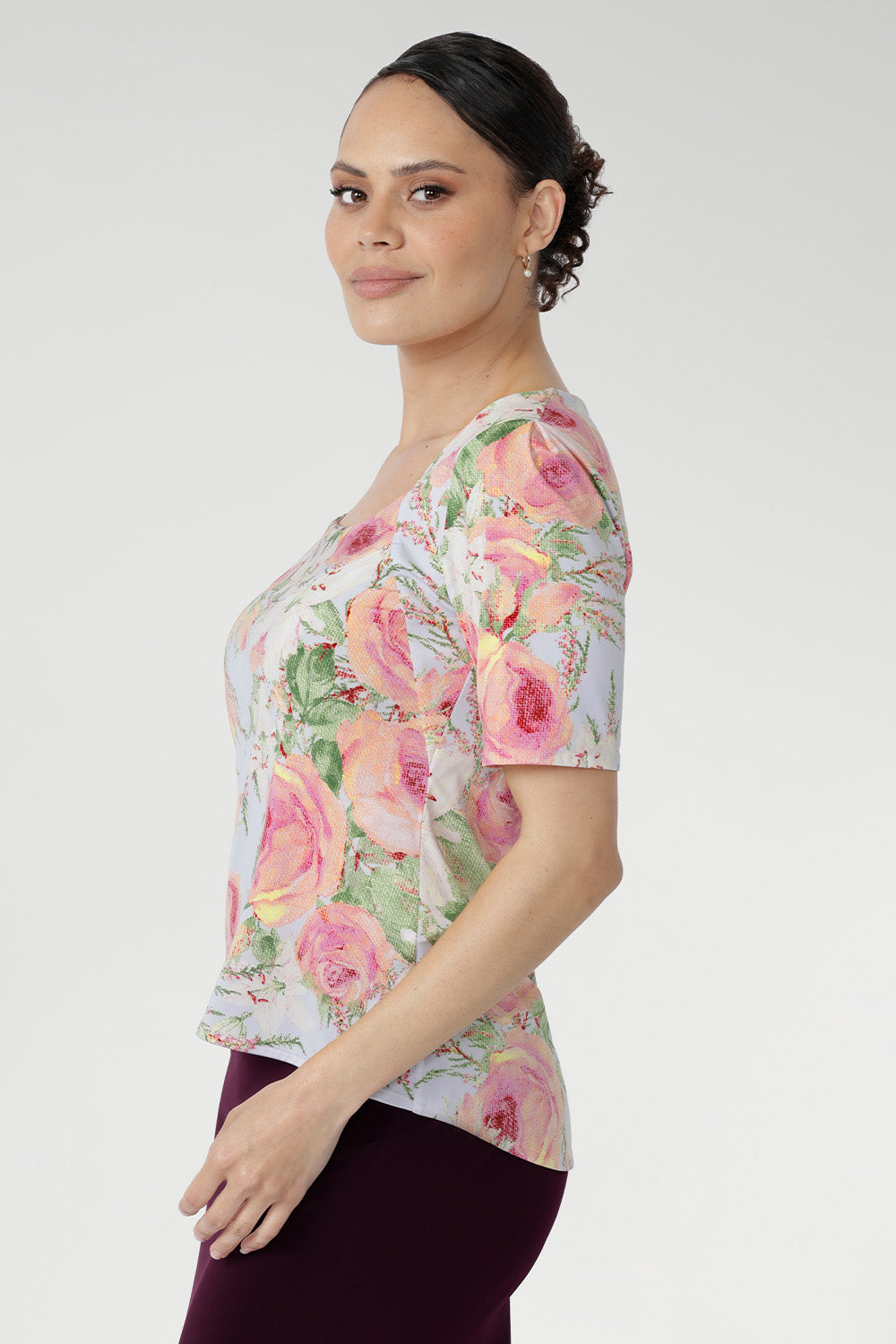 A straight front hemline that curves at the back gives this top a beautifully considered finish.