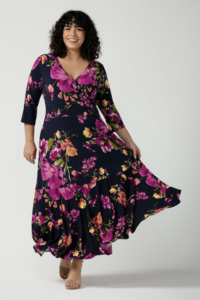Size 18 woman wears the Bettina Reversible dress in Celeste. Fixed wrap style with pockets and v-neckline. Wear it multiple ways and reversible. Made in Australia for women size 8 - 24.