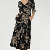 Crafted from our signature black dry-touch stretch jersey, this versatile midi dress is designed to deliver both style and function. Showcasing a deep, inky floral print in a rich coffee hue, it captures the moody elegance of the season.