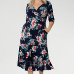 Designed for modern women who love to mix up their style, this flattering silhouette can be worn with the V-neck wrap front for a more defined, feminine shape, or reversed to feature a classic boat neckline that pairs beautifully with structured jackets or cardigans. Whether you're heading to a special event or dressing up for everyday elegance, this reversible maxi dress is a wardrobe essential.