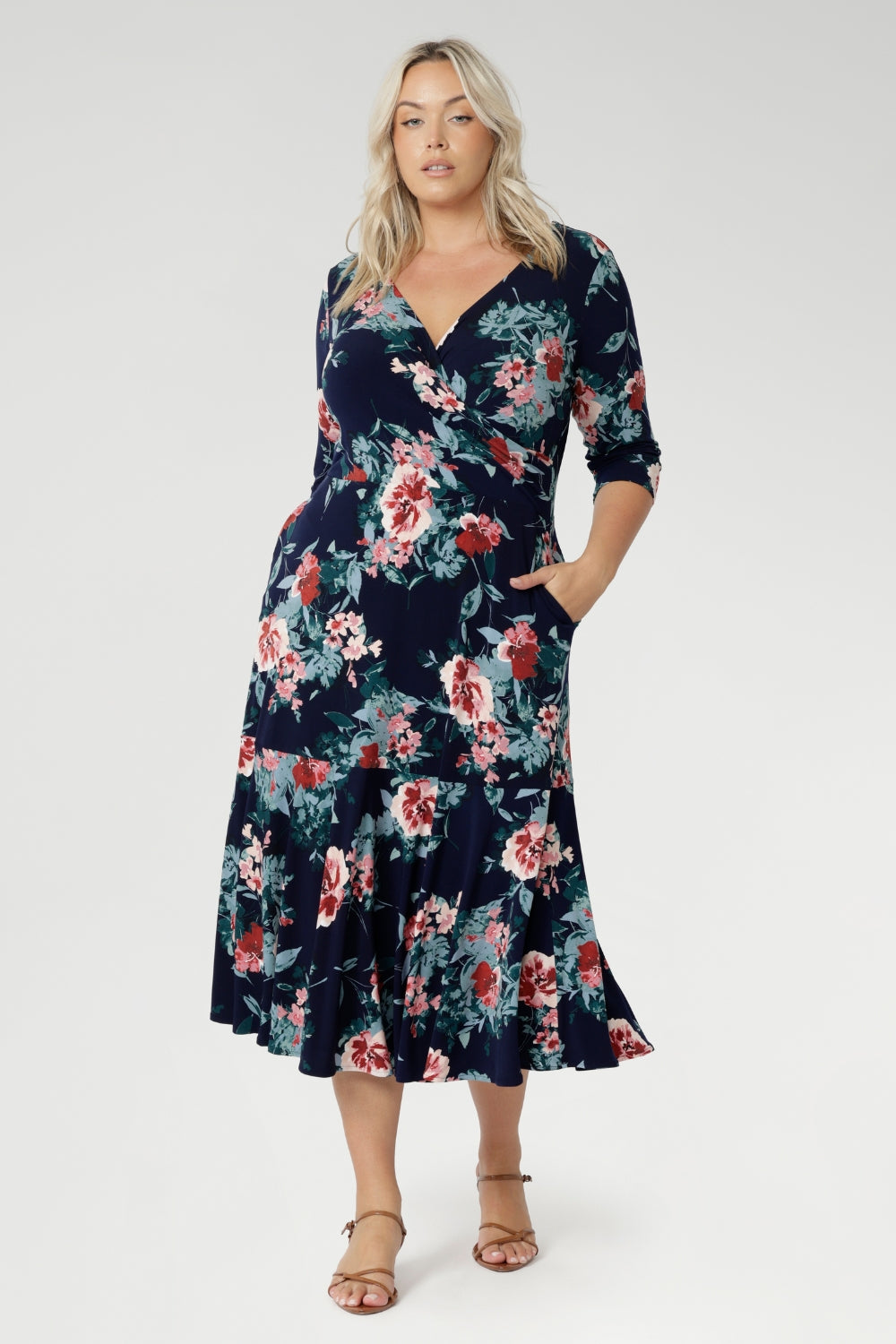 Designed for modern women who love to mix up their style, this flattering silhouette can be worn with the V-neck wrap front for a more defined, feminine shape, or reversed to feature a classic boat neckline that pairs beautifully with structured jackets or cardigans. Whether you're heading to a special event or dressing up for everyday elegance, this reversible maxi dress is a wardrobe essential.