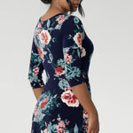 Whether you're heading to a special event or dressing up for everyday elegance, this reversible maxi dress is a wardrobe essential. Crafted from a soft-stretch, dry-touch jersey fabric, the Vintage Rose print features delicate floral detailing in shades of pink, red, and blue on a timeless navy background. The 3/4 length sleeves offer coverage with a touch of sophistication, while the flowing maxi skirt is finished with a ruffle hemline for added movement and flair.