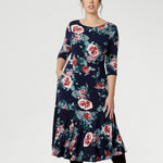The 3/4 length sleeves offer coverage with a touch of sophistication, while the flowing maxi skirt is finished with a ruffle hemline for added movement and flair. Thoughtfully designed with practical side pockets, a skirt lining, and a double-layer bodice and petite length skirt for the shorter women.