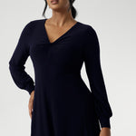 Featuring a sophisticated V-neckline with a twist-front bodice and cuffed long sleeves, it creates a flattering silhouette with elegant detail. Made in Australia from our signature dry-touch jersey fabric. Available in size 8-24. 