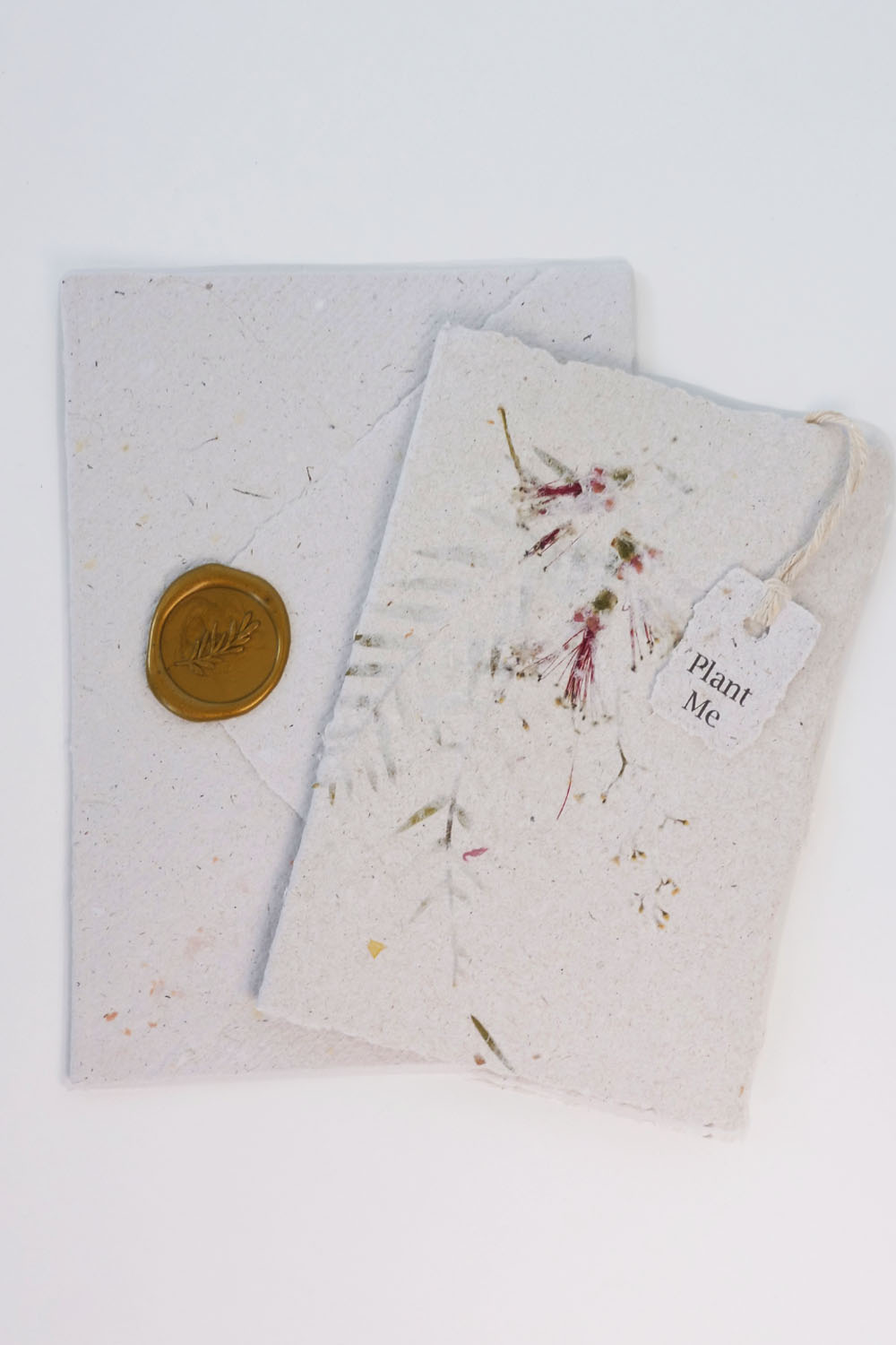 Handmade paper card with petal and leaf design Seed-embedded.  Matching envelope with wax seal. Cards can be planted in the ground. Environmentally friendly and made in Australia.