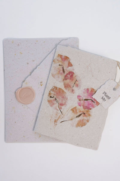 Handmade paper card with petal and leaf design Seed-embedded. Matching envelope with wax seal. Cards can be planted in the ground. Environmentally friendly and made in Australia.
