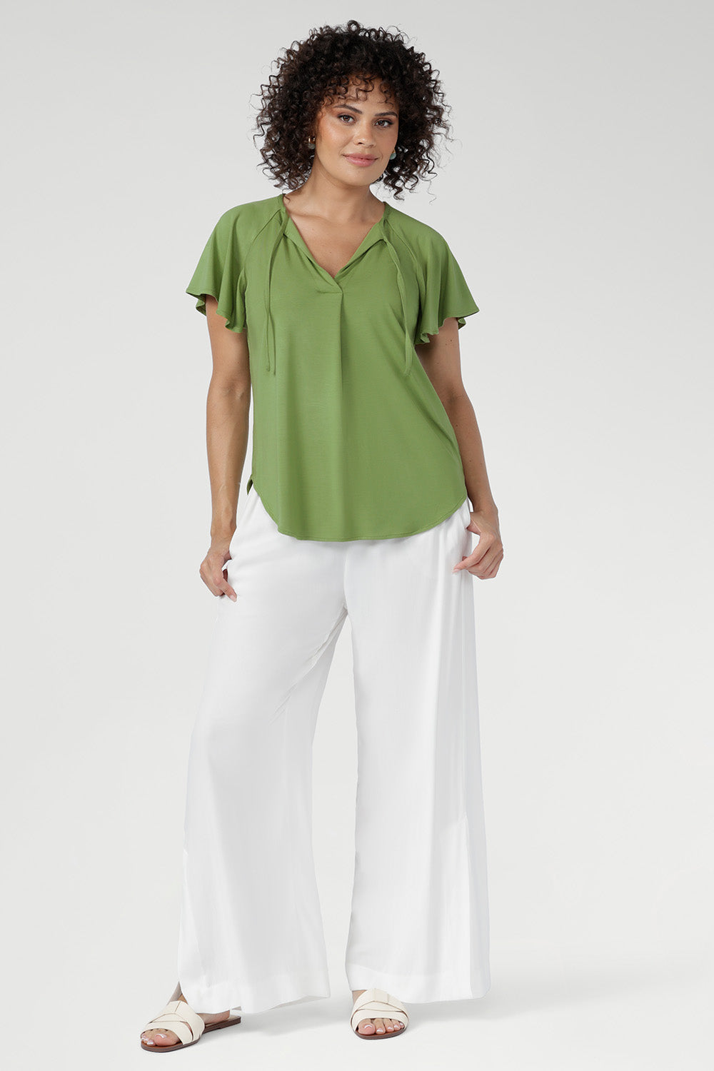 The fresh Apple shade brings a crisp, modern pop of colour with a quietly refined feel. Wear with tailored pants or relaxed culottes for an easy, coordinated look. Made in Australia with integrity.
