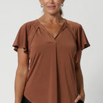 The Bowie Top is a must-have piece for any modern workwear wardrobe, offering effortless style and versatility. Its relaxed fit provides comfort while maintaining a polished, professional look. Available in sizes 8-24.