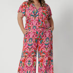 Styling option seen on a plus sized woman. Summer printed flutter sleeved top and matching printed pant to create faux jumpsuit look. Both pieces are stocked in sizes 8-24.
