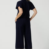 Back view of a size 10 woman wears the Bowie Top in Navy made in Australia for women size 8-24,