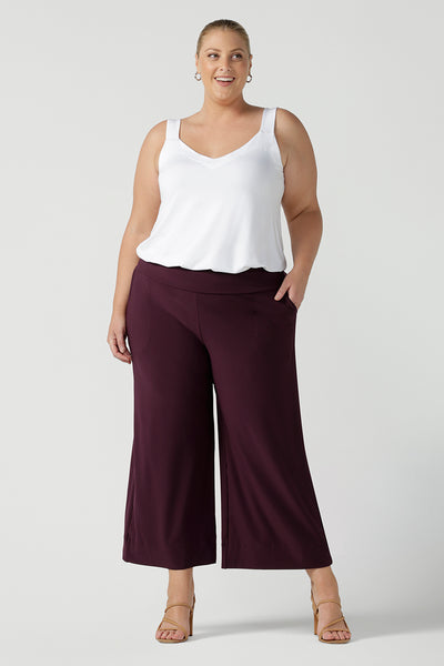 Womens stretch work pants. Plus size womens fashion on size 18 in stretch jersey. Size inclusive fashion. Wide leg pant in Mulberry. 