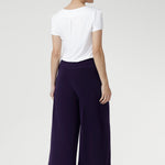 The Bradley Culotte in Purple is the perfect addition to your workwear wardrobe, offering a stylish yet comfortable option for the modern woman. 