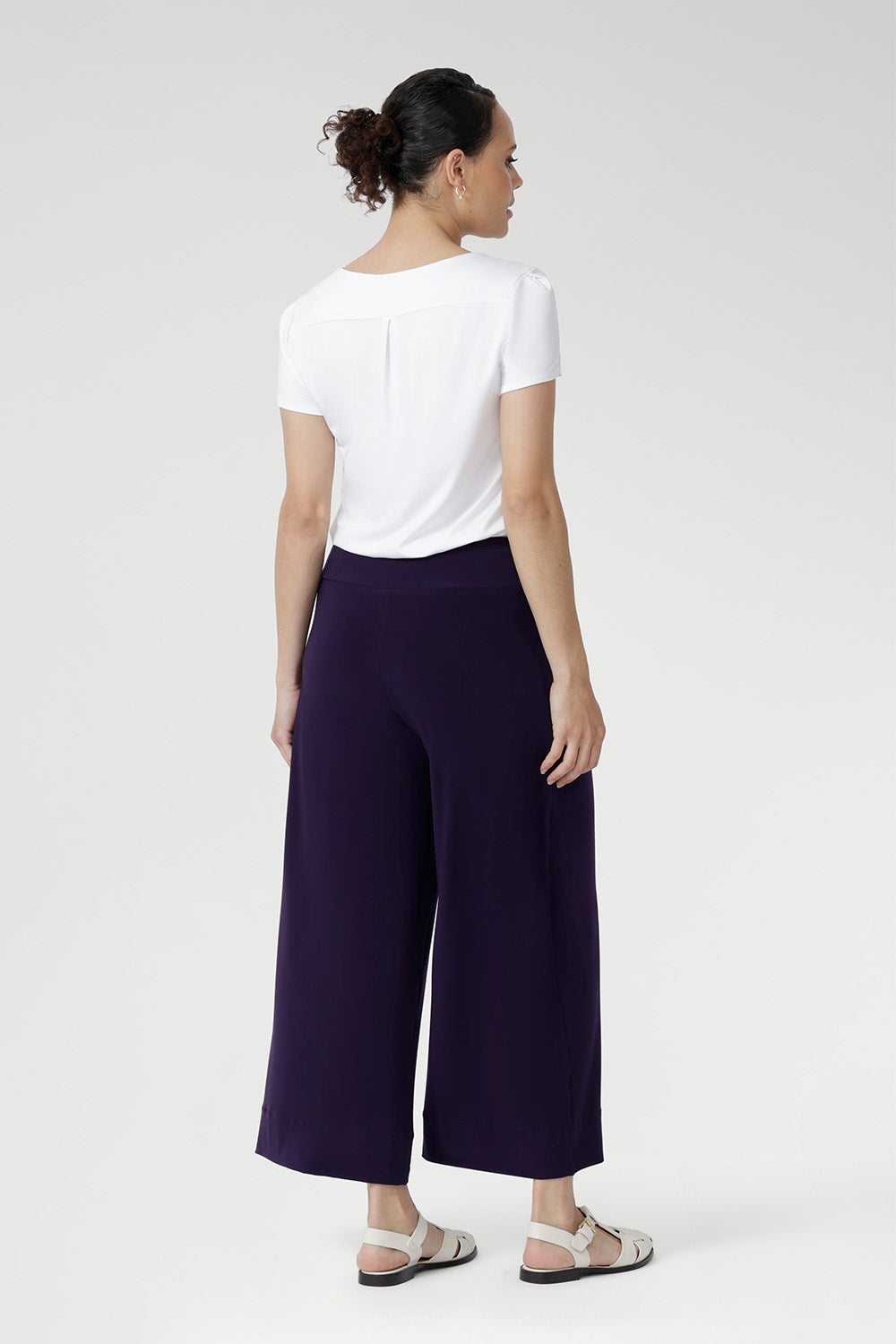 The Bradley Culotte in Purple is the perfect addition to your workwear wardrobe, offering a stylish yet comfortable option for the modern woman. 