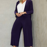 The Bradley Culotte in Purple is the perfect addition to your workwear wardrobe, offering a stylish yet comfortable option for the modern woman. Made from our luxurious jersey base, these culottes drape beautifully and provide all-day comfort, making them ideal for long hours in the office or business meetings. Designed to unite all heights, the Bradley Culotte offers versatility, combining chic sophistication with effortless wearability.