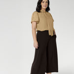 Petite Height woman wears a pair of Bradley Culotte Pants for a comfortable soft suiting combination. Available in sizes 8-24 and in 2 lengths.