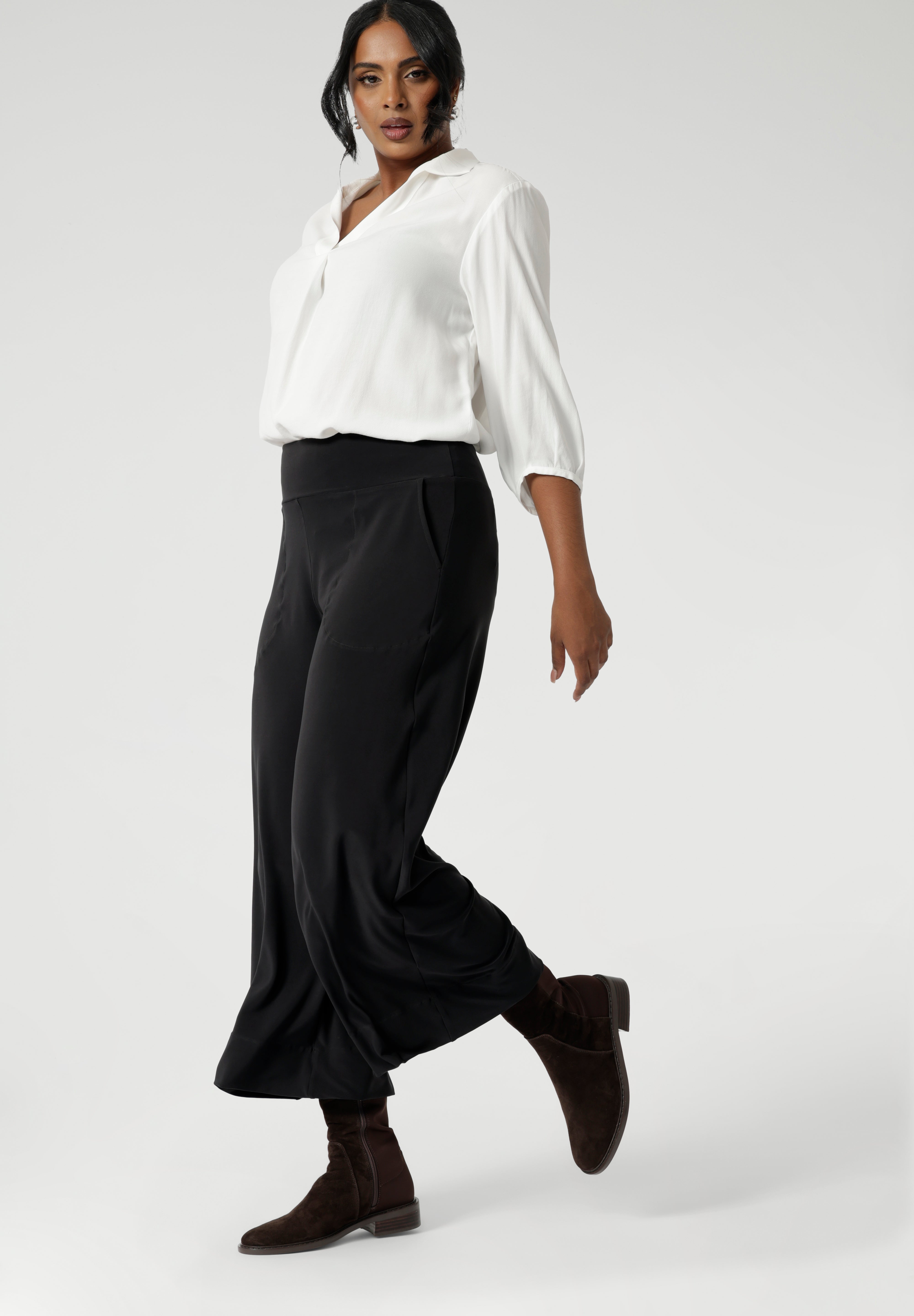 With a cropped length that’s ideal for showcasing shoes and providing a contemporary silhouette, these culottes are designed to elevate your professional style. The deep hem enhances the durability and structure of the pant, ensuring it retains its polished appearance over time. Available in sizes 8-24 