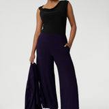 Available in sizes 8-24 and in both regular and short lengths, the Bradley Culotte caters to a variety of body types, ensuring the perfect fit for every woman. Pair them back with the Sandro Jacardi for a soft suiting combination that is both comfortable and chic. Over 30's woman wears culottes with black cowl neck top and matching cardigan. 