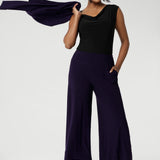 The Bradley Culotte in Purple is the perfect addition to your workwear wardrobe, offering a stylish yet comfortable option for the modern woman. Made from our luxurious jersey base, these culottes drape beautifully and provide all-day comfort, making them ideal for long hours in the office or business meetings.