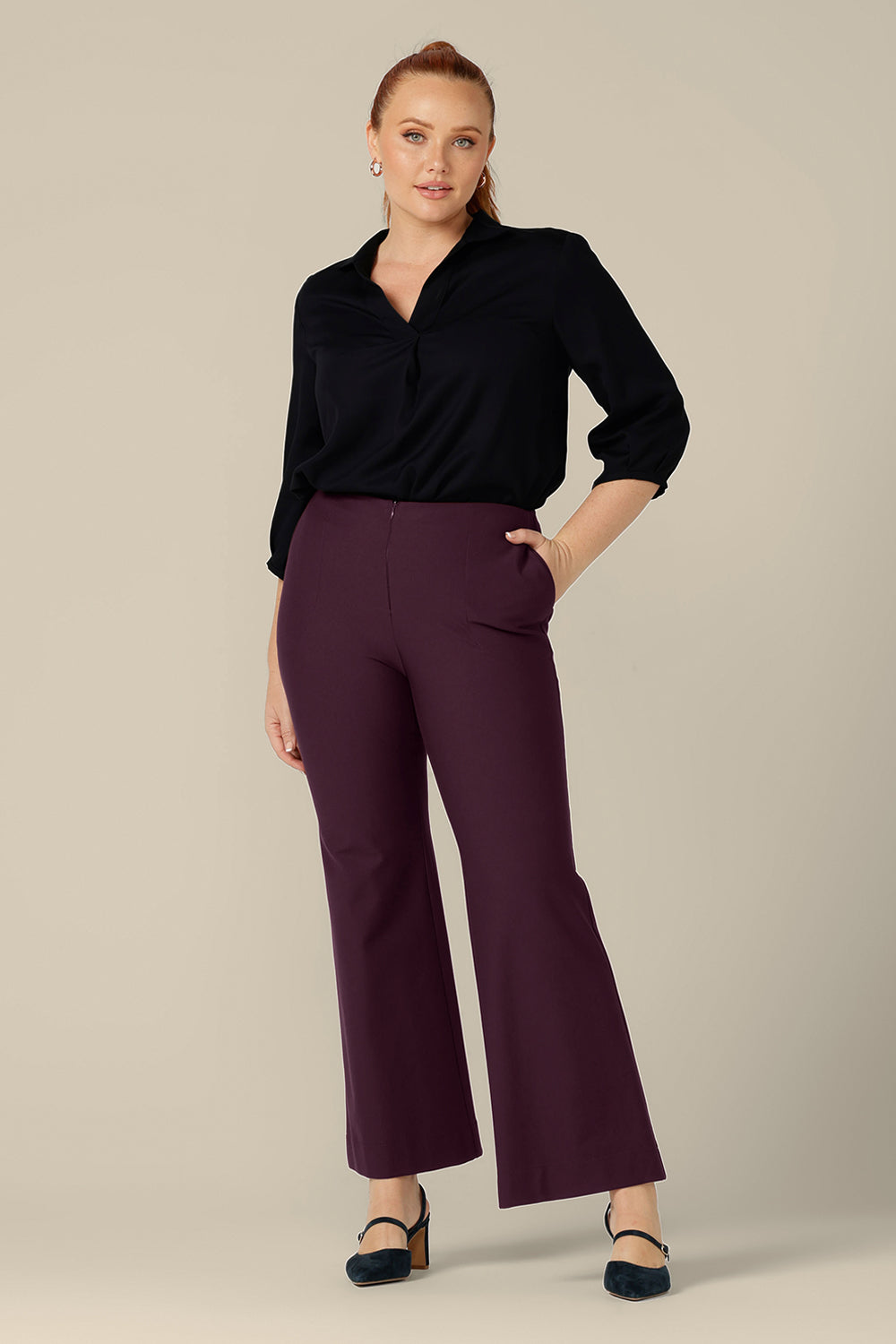 Good for workwear or evening wear pants, these mulberry trousers by Australia and New Zealand women's fashion label, L&F feature full-length, boot-cut flared legs. Worn with a black pull-on shirt for elegant workwear style