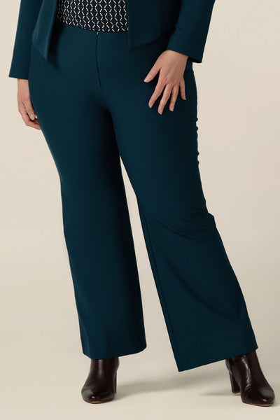 Petrol blue, tailored bootcut pants in size 18. Made in Australia in ponte fabric, these comfortable work pants are great for plus size women - shop in sizes 8 to 24.