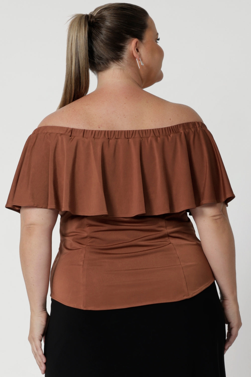 Available in sizes 8-24, the Briar Top is Australian-made by Leina & Fleur, crafted with care and attention to detail. It's luxurious fabric and versatile design make it a must-have. Available in sizes 8-24.