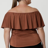 Available in sizes 8-24, the Briar Top is Australian-made by Leina & Fleur, crafted with care and attention to detail. It's luxurious fabric and versatile design make it a must-have. Available in sizes 8-24.