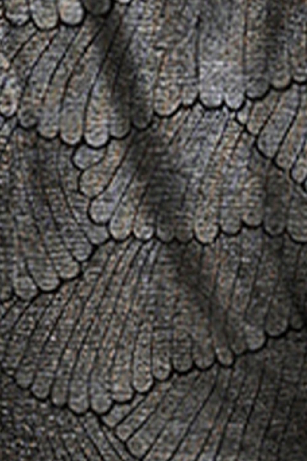 Fabric swatch of bronze foil metallic print jersey fabric used by Australian occasionwear brand, Lein ana Fleur to make women's tops for going out.