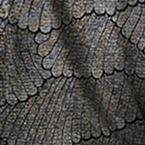 Fabric swatch of bronze foil metallic print jersey fabric used by Australian occasionwear brand, Lein ana Fleur to make women's tops for going out.