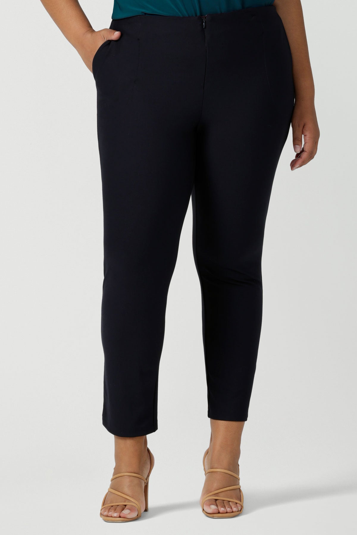 Slim leg, cropped length navy pants for work wear and weekend wear. These stretchy women's trousers make great pants for your capsule wardrobe. Made in Australia by Australian and New Zealand women's clothing label petite to plus sizes 8-24.