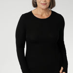 Crafted from a luxe blend of Tencel wool, this soft knit top is your go-to light layer for the cooler months. Featuring a classic round neckline and long sleeves, it’s designed with comfort in mind — offering generous stretch and a smooth, breathable feel, without the itch of traditional merino. Worn solo or layered under a jacket or coat, it pairs effortlessly with your favourite pants or skirts for an elegant, everyday look.