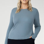 Stay effortlessly stylish through the cooler months with this luxuriously soft knit top, crafted from a premium Tencel wool blend. Designed for comfort and versatility, it features a flattering close-to-body fit that moves with you, thanks to its generous stretch and breathable finish.