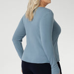 Stay effortlessly stylish through the cooler months with this luxuriously soft knit top, crafted from a premium Tencel wool blend. Designed for comfort and versatility, it features a flattering close-to-body fit that moves with you, thanks to its generous stretch and breathable finish.