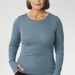 Stay effortlessly stylish through the cooler months with this luxuriously soft knit top, crafted from a premium Tencel wool blend. Designed for comfort and versatility, it features a flattering close-to-body fit that moves with you, thanks to its generous stretch and breathable finish. 