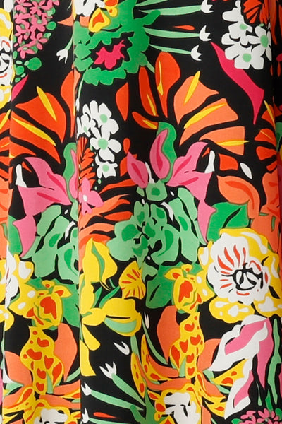 Bright and colourful jersey cancun print on a black base. Designed and made in Australia sizes 8-24.
