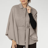 Wrap yourself in luxurious comfort this winter with our beautifully crafted women's cape, made in Australia by Leina + Fleur. Expertly tailored from a premium blend of Polyester, Viscose, Tencel, Silk, and Wool, this cape delivers a sophisticated balance of softness, warmth, and breathability — perfect for layering through the cooler seasons.
