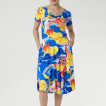 Feel cool, confident, and effortlessly put-together in the Casey Dress in Summer Bliss. Crafted from our signature slinky jersey, it offers a soft stretch and refreshing touch against the skin. With its cowl neckline, relaxed blouson shape, and flowing asymmetrical skirt, this floral beauty is perfect for sunny days, seaside escapes, and easy weekends. Made in Australia, sizes 8–24.