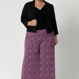 Wide leg pants perfect for occasion wear come in a stunning colors palette of magenta, pink, graphite, and vanilla. Dynamic pattern that adds interest without being overwhelming. Available in sizes 8-24.