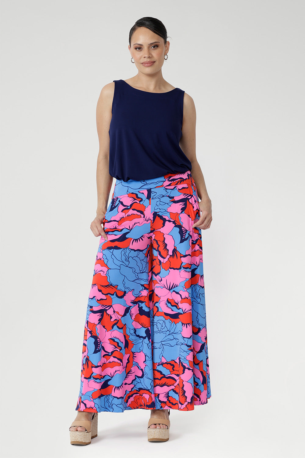 These party ready caspian Palazzo Pants offer a wide-leg silhouette, double-layer waistband, and practical side pockets - in a beautiful and bold print - ready for summer dressing and event season - Available in sizes 8-24. Australian made.