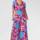 Party-ready and effortlessly chic, the Caspian Palazzo Pants feature a flattering wide-leg silhouette, double-layer waistband, and practical side pockets. Crafted in a bold, beautiful print that’s perfect for summer events. Proudly Australian made and available in sizes 8–24.