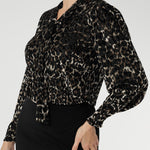  The striking animal burnout print is set against a soft, stretchy black jersey base that offers comfort without compromising on style.