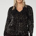 Featuring a flattering V-neckline with attached soft neck ties, the Celine Top allows for multiple styling options—tie them loosely, knot them, or fashion a bow for a feminine touch. Full-length bell sleeves with subtle gathers at the shoulders and a tailored dart at the wrist add movement and refined flair