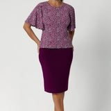 The flutter detail adds movement and softness, enhancing the overall sense of occasion. Flutter sleeved top can also be work with corporate bottoms creating a colourful workwear look. Over 40's woman wears her Chloe Top in size 12.