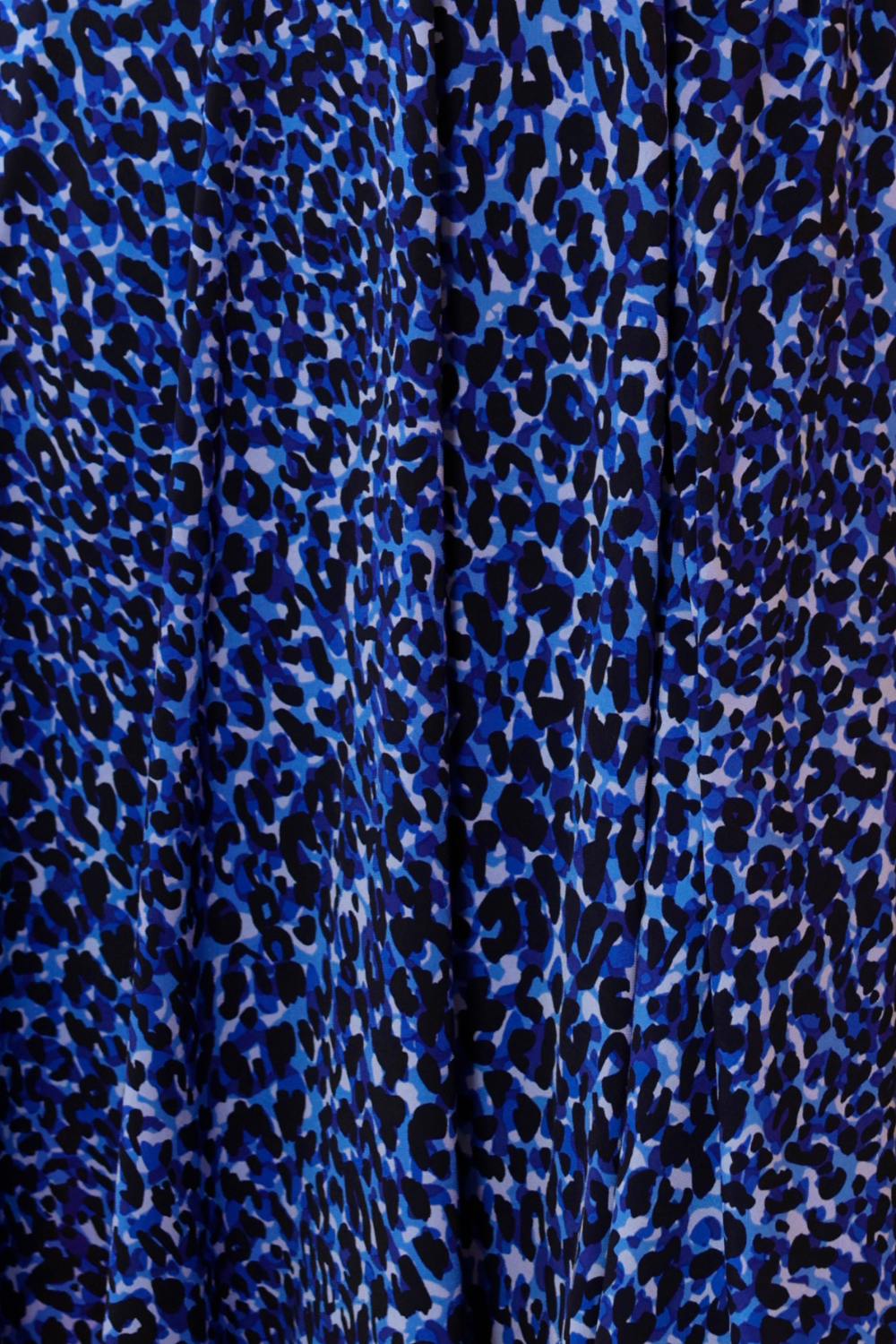 swatch of cobalt jaguar animal print jersey fabric used by Australian and New Zealand women's clothing brand, Leina & Fleur to make fixed wrap dresses in sizes 8 to 24.