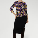 Designed to contour with a close-to-body fit, the Collins Top features thoughtful bust darts and a longer curved hem at the back for extra coverage and a polished finish. Available in inclusive sizes 8–24 and proudly designed and made in Australia.