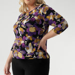 Crafted from premium dry-touch jersey fabric with a soft stretch, this flattering top offers a chic boat neckline, ¾ sleeves, and a soft, dipped hemline that creates a beautifully balanced silhouette. Designed to contour with a close-to-body fit, the Collins Top features thoughtful bust darts and a longer curved hem at the back for extra coverage and a polished finish.