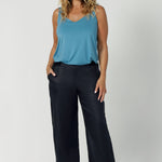 These linen pants are the perfect blend of comfort, style, and sustainability. Designed for effortless wear and modern elegance. The pull-on, mid-rise style offers a relaxed yet flattering fit, while the waistband is crafted from stretch bamboo jersey, providing flexibility and comfort throughout the day. Leina & Fleur stock these linen pants in sizes 8-24.